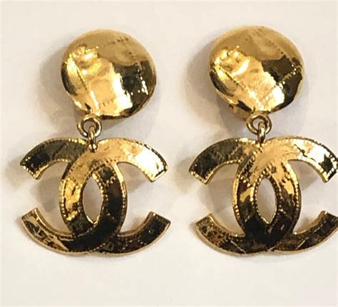 chanel cc logo dangle earrings|1986 cc dangle clip on earrings.